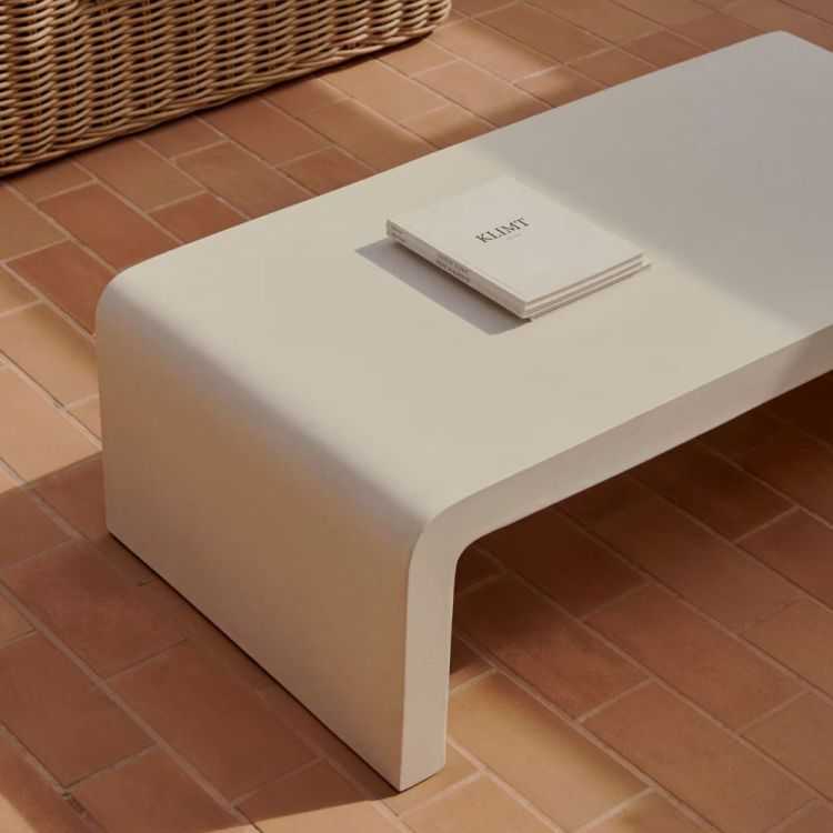 TABLE BASSE AIGUABLAVA135 X 65 CMCIMENT BLANC 